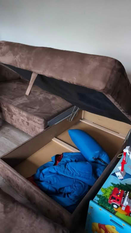 Photo of free L-shape sofa bed (Byfleet KT14) #3