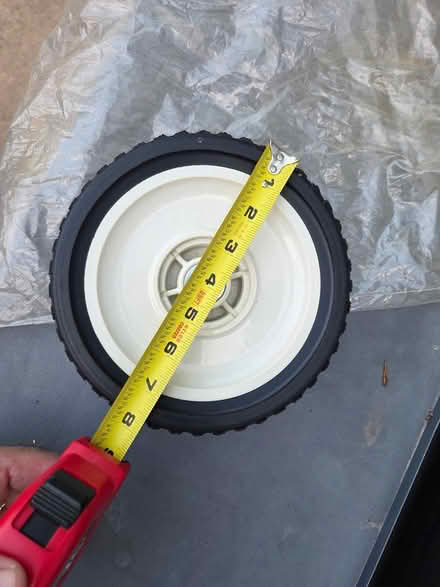 Photo of free Honda Mower Wheel 44710-VE0-000 (Elmhurst near Berens Park) #1