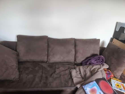 Photo of free L-shape sofa bed (Byfleet KT14) #1