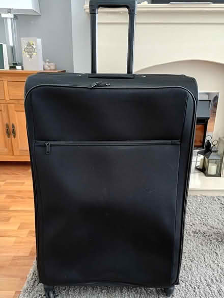 Photo of free Large Black Suitcase (L14 Dovecot) #1