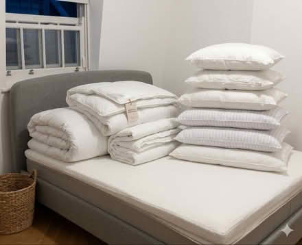 Photo of free Three double duvets and ten pillows (Notting Hill Gate W11) #1