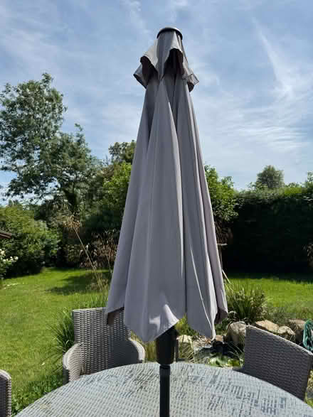 Photo of free garden umbrella with base (Little Bookham KT23) #2