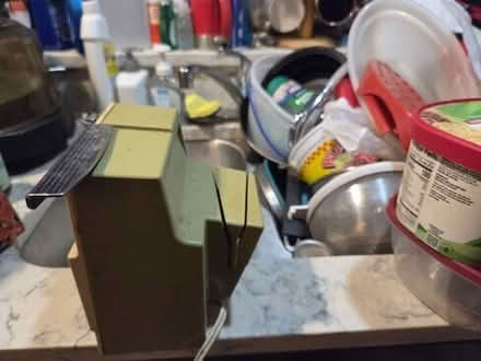 Photo of free can opener with knife sharpener #1