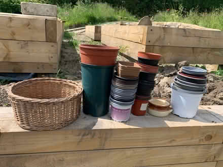 Photo of free Plastic plant pots various sizes and wicker basket (Norton Lees S8) #1