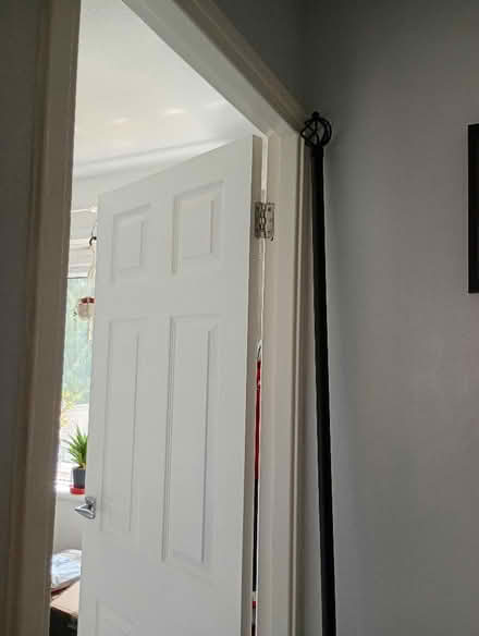 Photo of free Black metal curtain pole. (Temple Cowley OX4) #3