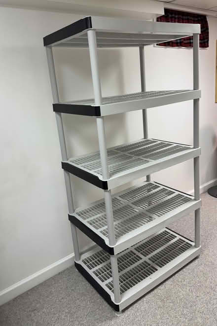 Photo of free Shelving Unit (durable plastic) (Columbia, MD (Hickory Ridge)) #1