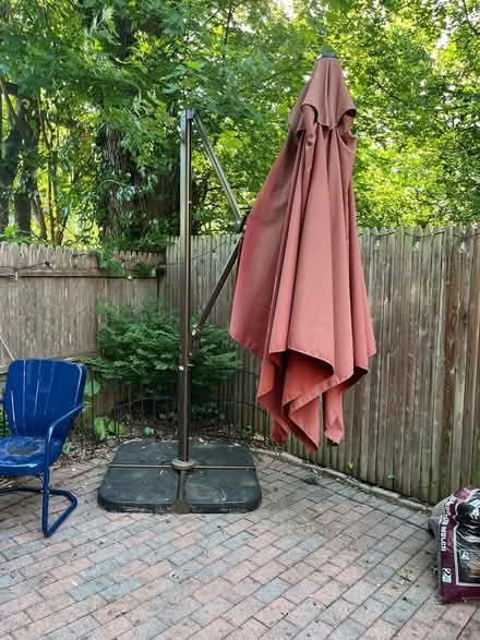Photo of free Large outdoor umbrella / needs work (Chevy Chase DC) #2