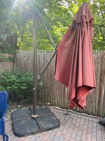 Photo of free Large outdoor umbrella / needs work (Chevy Chase DC) #1