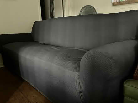 Photo of free Bonded leather couch with cover (East Pensacola Heights) #1
