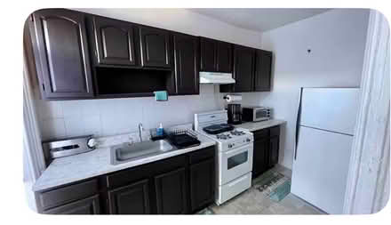 Photo of free Stove and refrigerator (Stuyvesant Heights) #1