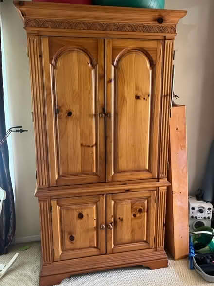 Photo of free Wood entertainment center (East End Alameda) #1