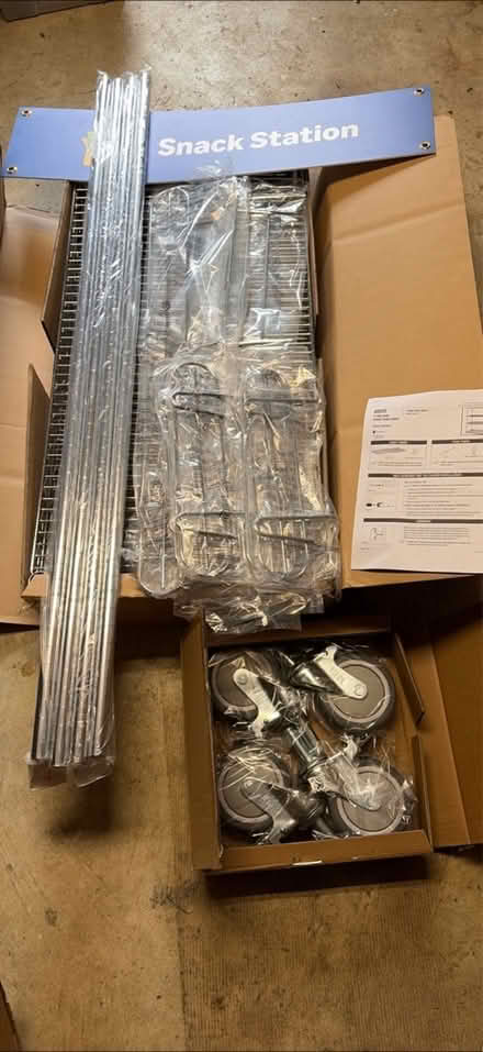 Photo of free Metal shelving unit NIB U-line (Arnold) #1