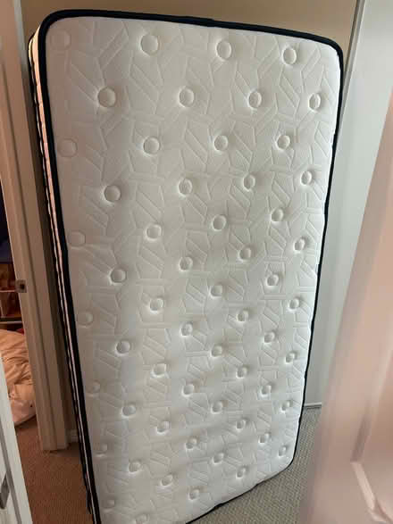 Photo of free Twin coil spring mattress (Blackburn Hamlet) #1