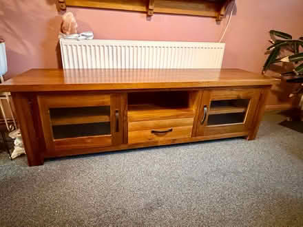 Photo of free Lovely solid wood tv cabinet (Lu7 9qd) #2