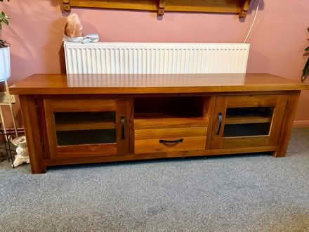 Photo of free Lovely solid wood tv cabinet (Lu7 9qd) #3