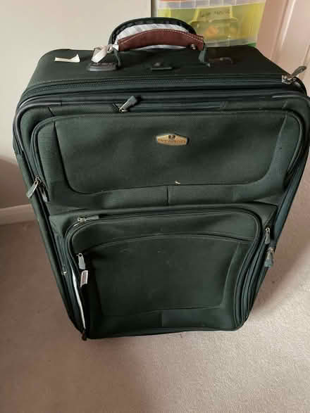 Photo of free Large suit case + suit carrier (RH16) #2