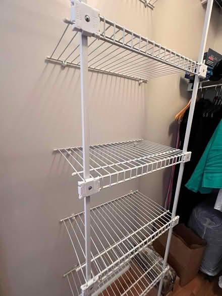 Photo of free Closet Shelving Unit (TidePointe Way, condo unit.) #1