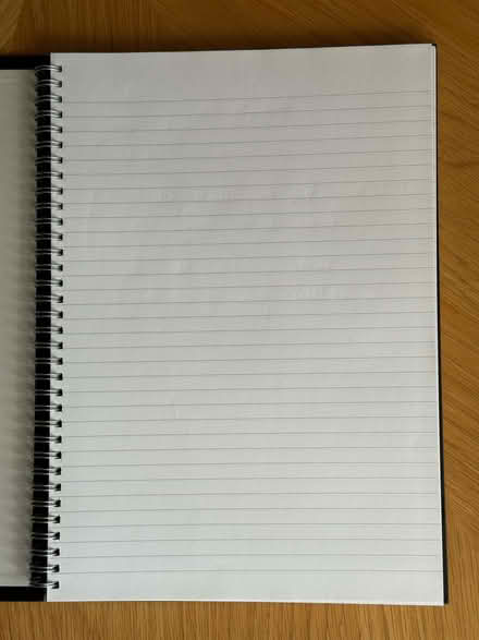 Photo of free Can deliver: Black A4 spiral bound notebook with lined pages (Lower Earley RG6) #1