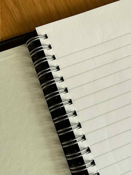 Photo of free Can deliver: Black A4 spiral bound notebook with lined pages (Lower Earley RG6) #2