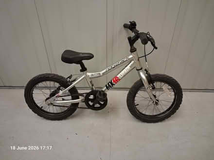 Photo of free silver Ridgeback MX16 bike (16in wheels) (Woodlands TW7) #1