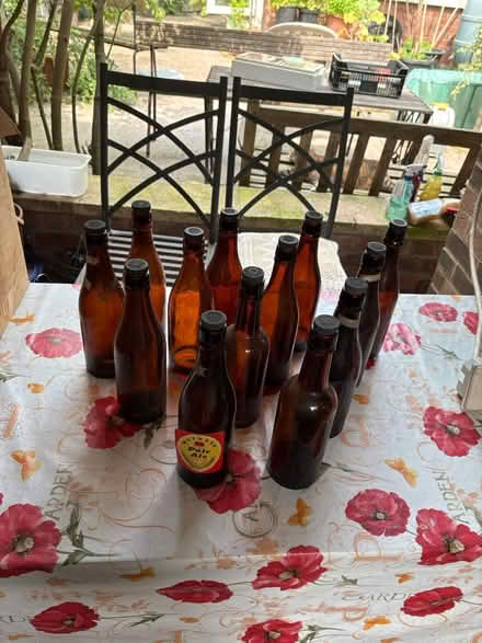 Photo of free 23 one pint screw top beer bottles (London W3) #2