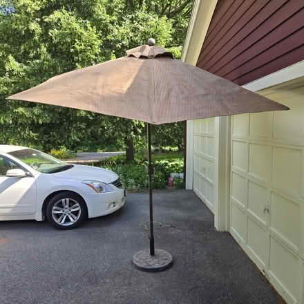 Photo of free Umbrella with metal stand/base (Groton/Ayer line of rt 111) #1