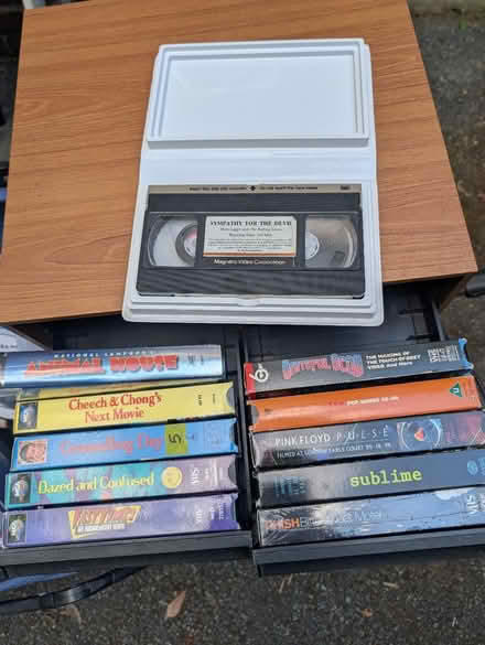 Photo of free Dozen VHS & case (Bethesda, MD) #1