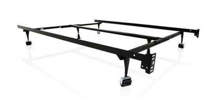 Photo of free Adjustable Queen Metal Bed Frame (Hastings Drive Latham NY) #1