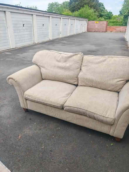 Photo of free Two seater sofa (Hucclecote Road Gloucester) #1
