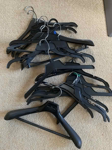 Photo of free 19 black department store hangers (Greenwood) #1