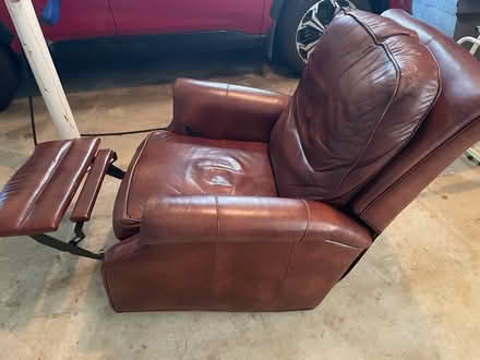 Photo of free Leather swivel recliner (Near SBHS) #1