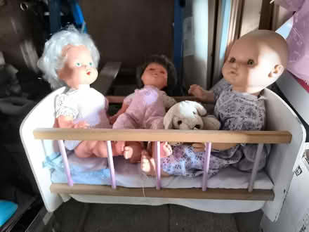 Photo of free Swinging doll's crib with dolls (Inverurie AB51) #1