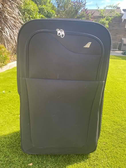 Photo of free Black soft shell suitcase (Stubbington) #1