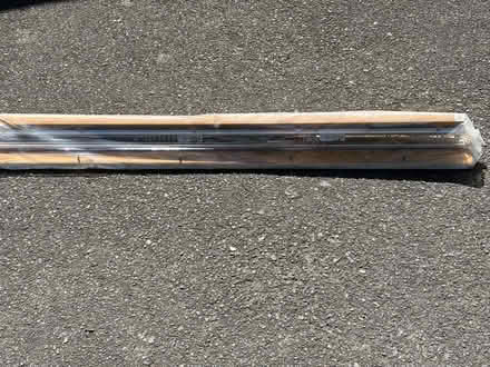 Photo of free 2 curtain tracks on board (West Horsley KT24) #3