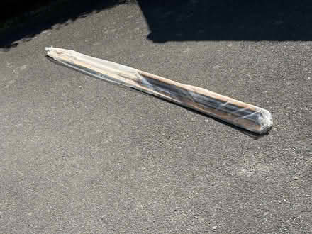 Photo of free 2 curtain tracks on board (West Horsley KT24) #1