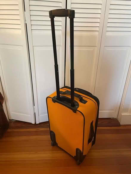 Photo of free small yellow suitcase (Brookline) #4
