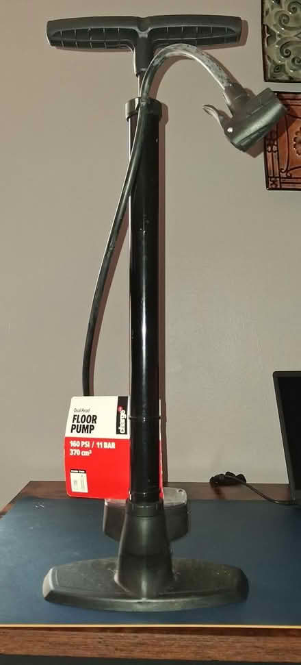 Photo of free Wood Futon and Bike Pump (Shallowford Road Atlanta 30345) #2