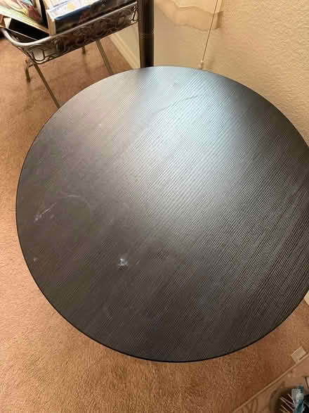 Photo of free Black wood top table (Moreno Valley) #3